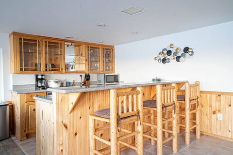First floor kitchen with bar stools