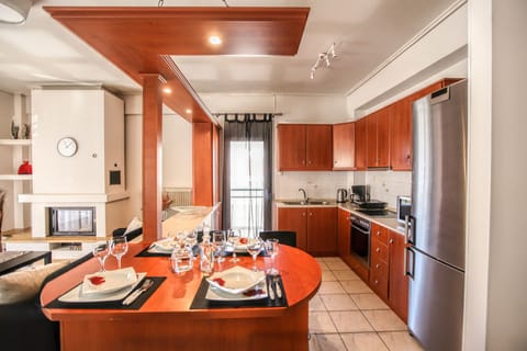 Grand Apartment | Private kitchen | Fridge, coffee/tea maker, electric kettle, dining tables