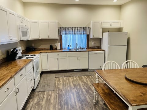 Large fully stocked eat-in kitchen.