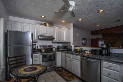 House, Multiple Beds, Fireplace | Private kitchen | Fridge, microwave, oven, stovetop