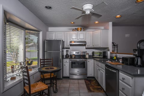 House, Multiple Beds, Fireplace | Private kitchen | Fridge, microwave, oven, stovetop