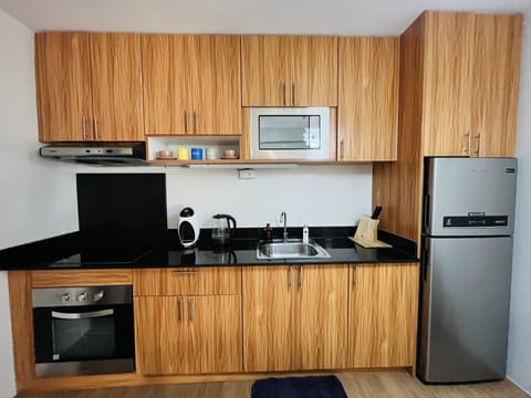 Apartment | Private kitchen | Fridge, microwave, oven, stovetop