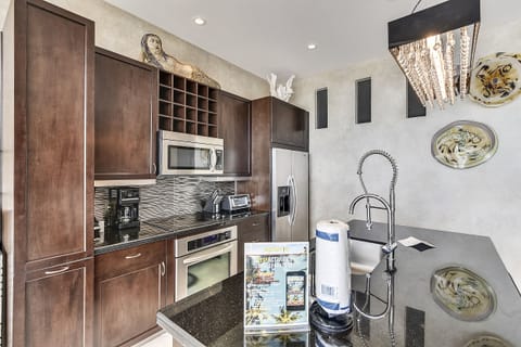 Condo, Multiple Beds, Ocean View | Private kitchen | Fridge, microwave, oven, stovetop