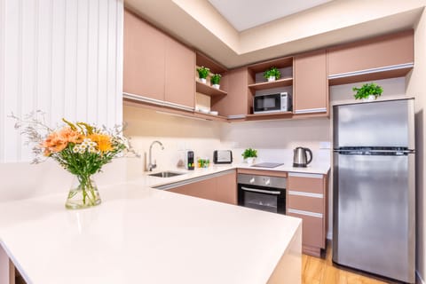 Comfort Apartment | Private kitchen | Full-size fridge, microwave, oven, toaster