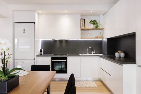 Luxury Apartment, 1 Bedroom | Private kitchen | Full-size fridge, oven, stovetop, dishwasher