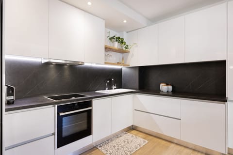 Luxury Apartment, 1 Bedroom | Private kitchen | Full-size fridge, oven, stovetop, dishwasher