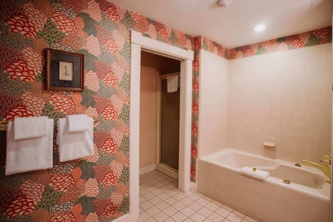 Deluxe Room | Bathroom | Designer toiletries, hair dryer, bathrobes, slippers