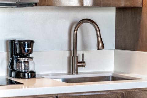 Fridge, microwave, stovetop, coffee/tea maker