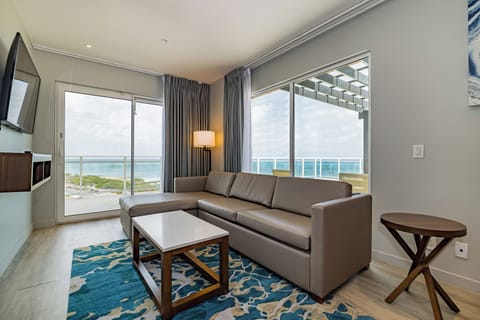 Room, 1 Bedroom, Oceanfront | Living area | 50-inch Smart TV with cable channels, TV