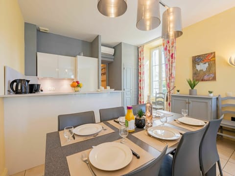 Property, Furniture, Table, Cabinetry, Countertop, Lighting, Architecture, Floor, Interior Design, Chair