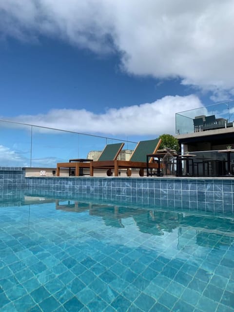 Outdoor pool, sun loungers