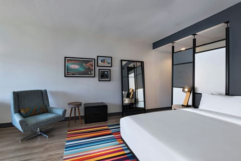 Suite, 1 King Bed, Pool View | Down comforters, pillowtop beds, in-room safe, iron/ironing board