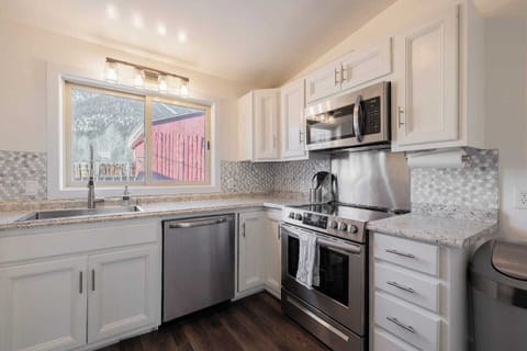 HUGE kitchen with stainless steal appliances and all necessary essentials.