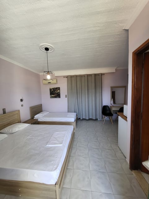 Standard Triple Room | In-room safe, iron/ironing board, free WiFi, bed sheets