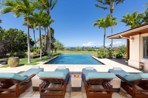 Sit back, relax, & soak in the views of the vividly blue Pacific past the infinity pool.