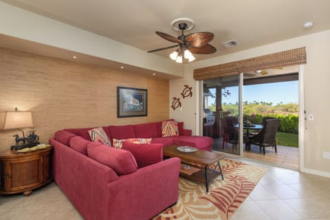 Living room with views overlooking the historic Kalahuipua'a lava fields. 