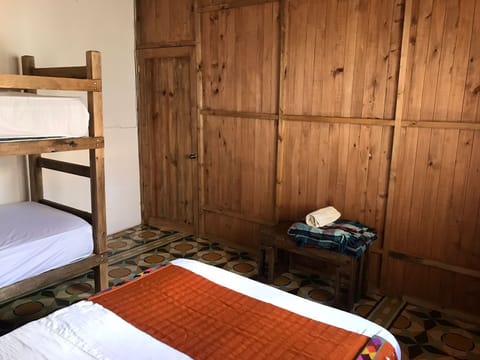 Economy Quadruple Room, 1 Bedroom | Free WiFi, bed sheets