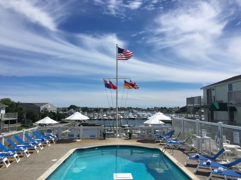 Seasonal outdoor pool, pool umbrellas, sun loungers