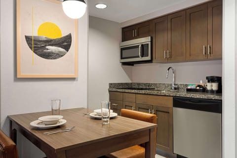 Suite, 1 Bedroom | Private kitchen | Full-size fridge, microwave, stovetop, dishwasher