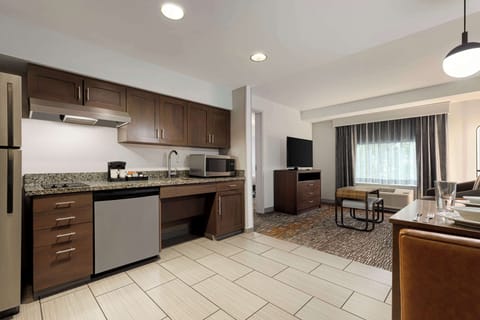 Suite, 1 King Bed with Sofa bed | Private kitchen | Full-size fridge, microwave, stovetop, dishwasher