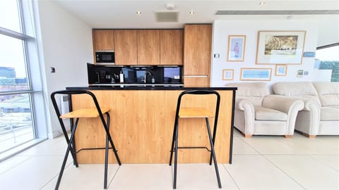 Premium Penthouse | Private kitchen | Fridge, microwave, oven, stovetop