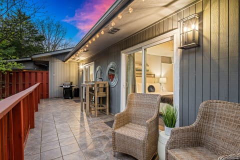 Shot of the back deck at night. There's even a heat lamp so the deck can be used on cooler nights too!