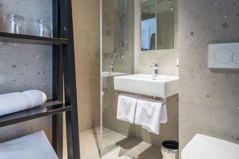 Superior Room | Bathroom | Shower, hair dryer, towels