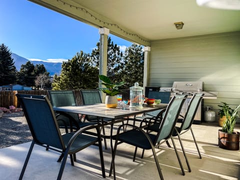 Back porch table and grill with amazing foothill mountains in the background