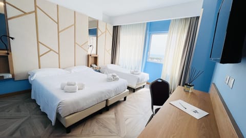 Superior Triple Room | Minibar, in-room safe, blackout drapes, free WiFi