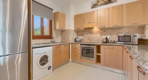 Luxury Apartment | Private kitchen | Full-size fridge, microwave, oven, stovetop