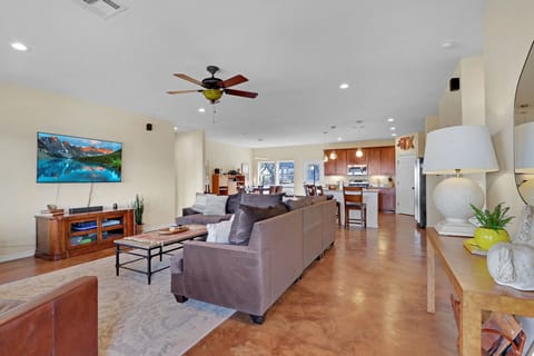 View from the entry door of the main house which opens into the living room. The kitchen is beyond the living room.