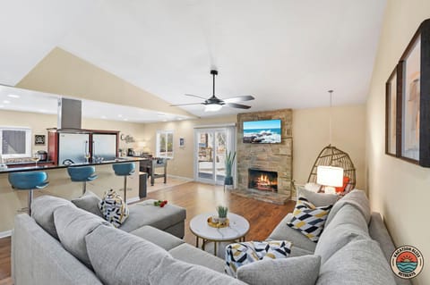 Snuggle up for family movie night by the warm, inviting glow of the fire.