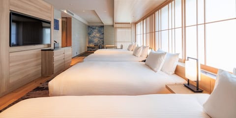 Deluxe Quad Room with Tatami Space, Non Smoking (Max 4 Adults) | Premium bedding, in-room safe, free WiFi, bed sheets