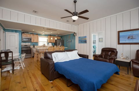 The couch pulls out to a queen size bed with memory foam mattress