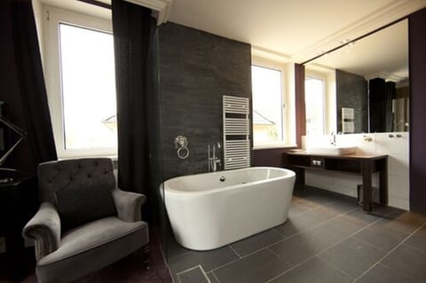 Deluxe Double Room | Bathroom | Eco-friendly toiletries, hair dryer, towels