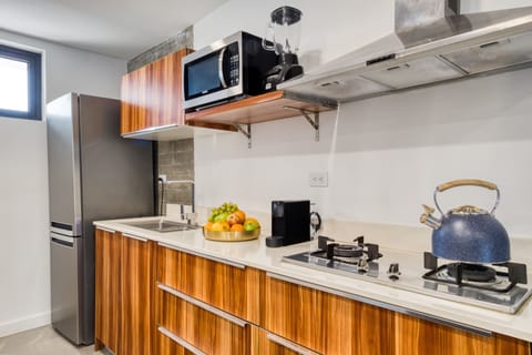 Master Apartment with Balcony | Private kitchen | Full-size fridge, microwave, stovetop, espresso maker