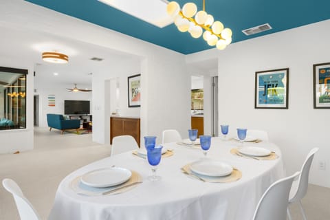 Dining, kitchen, and living area