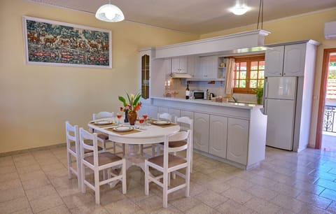 Villa Christine Afionas Corfu Kitchen And Dining Area