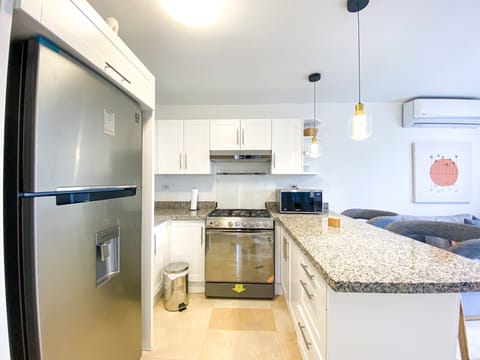 Comfort Villa, Balcony, Garden View | Private kitchen | Fridge, microwave, stovetop, toaster