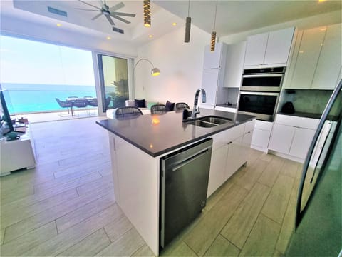 Luxury Condo, 1 Bedroom, Ocean View | Private kitchen | Full-size fridge, microwave, oven, stovetop