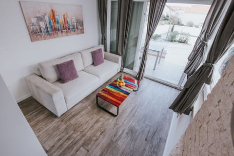 Deluxe Studio, Non Smoking, Pool Access | Living area | 45-inch flat-screen TV with satellite channels, TV