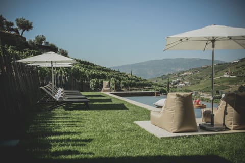 Seasonal outdoor pool, pool umbrellas, sun loungers