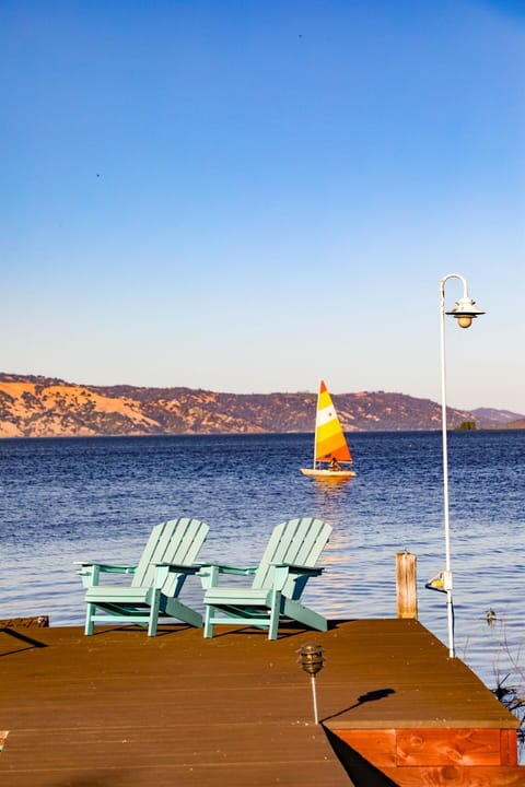 Front-row lakefront at golden hour — your private dock + sunset views over Clear Lake & Mt. Konocti: it's all included at Escap'Inn @TheLake!