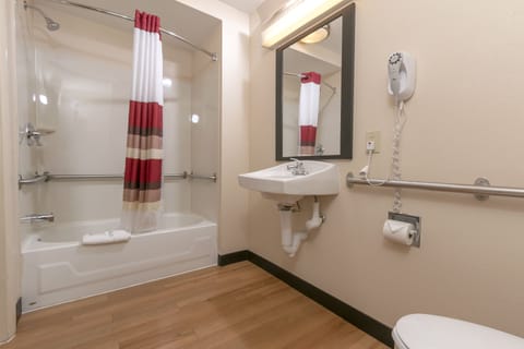 Deluxe Room, 1 King Bed, Accessible (Smoke Free) | Bathroom | Combined shower/tub, free toiletries, hair dryer, towels