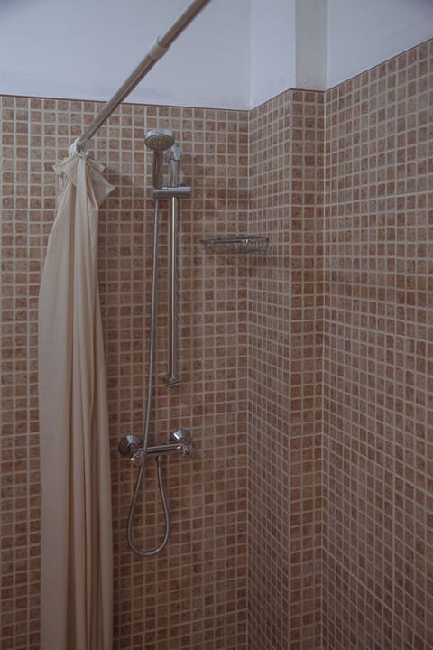 Comfort Apartment | Bathroom | Shower, towels