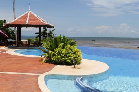 Outdoor pool, pool umbrellas, sun loungers