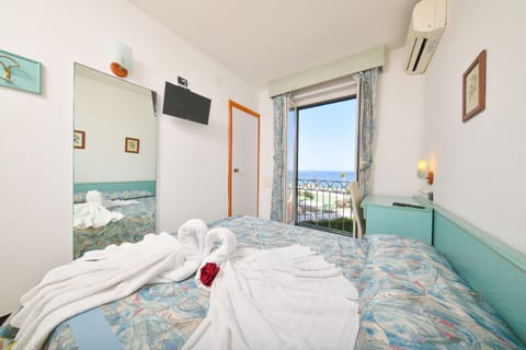 Double Room, Sea View | Desk, rollaway beds, free WiFi, bed sheets