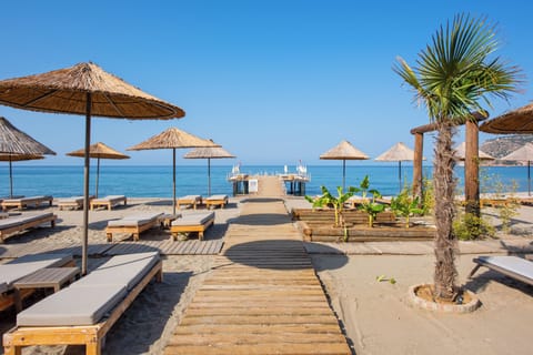 Private beach, free beach cabanas, beach shuttle, sun loungers