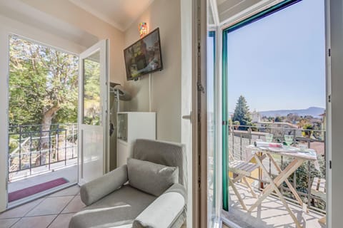 Standard Studio, Lake View (Nido Belvedere Lake View) | Living area | 21-inch flat-screen TV with digital channels, TV