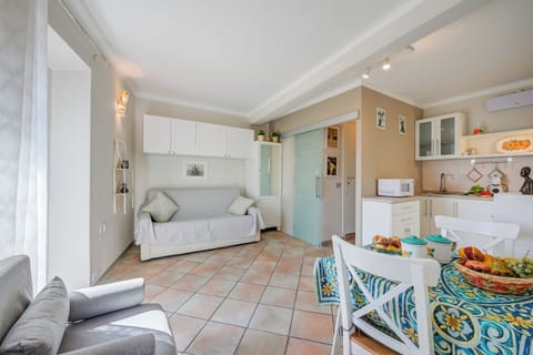 Standard Studio, Lake View (Nido Belvedere Lake View) | Living area | 21-inch flat-screen TV with digital channels, TV